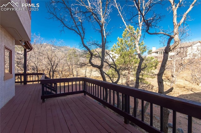 3012 S Electra Dr, Colorado Springs, CO 80906 - wooden terrace featuring a mountain view