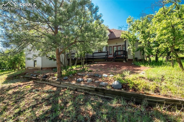 3012 S Electra Dr, Colorado Springs, CO 80906 - view of yard featuring a deck