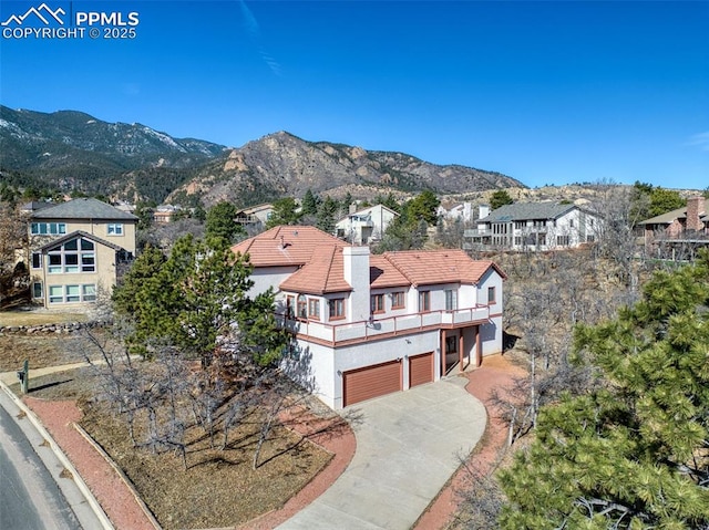 3012 S Electra Dr, Colorado Springs, CO 80906 - aerial view of residential area with a mountain backdrop