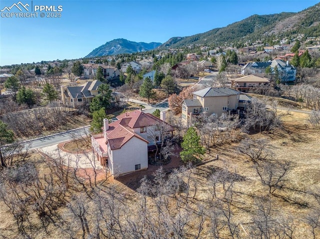3012 S Electra Dr, Colorado Springs, CO 80906 - aerial view of residential area featuring a mountain backdrop