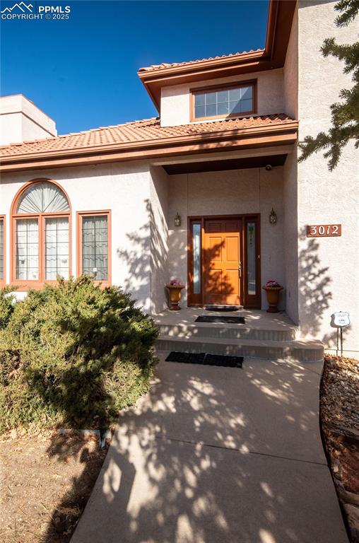 3012 S Electra Dr, Colorado Springs, CO 80906 - entrance to property featuring stucco siding