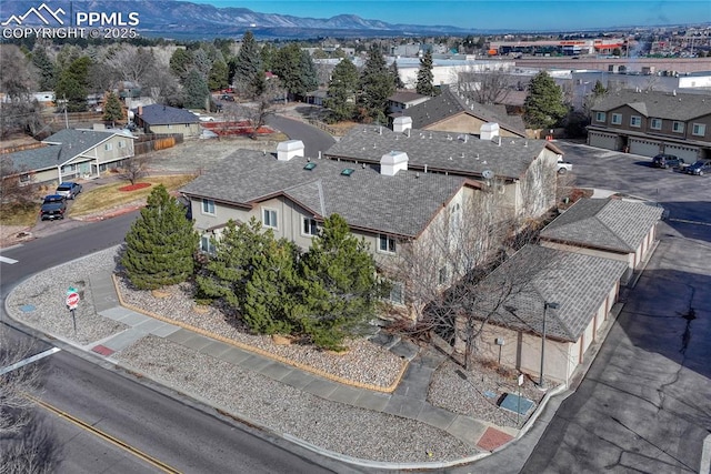 drone / aerial view with a mountain view and a residential view