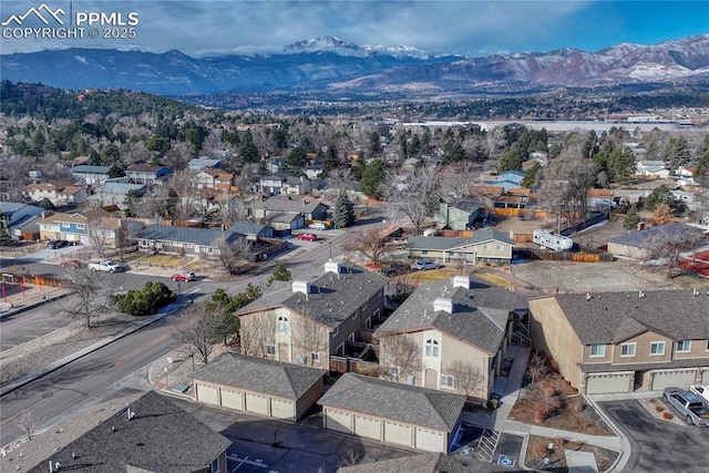 drone / aerial view with a mountain view and a residential view