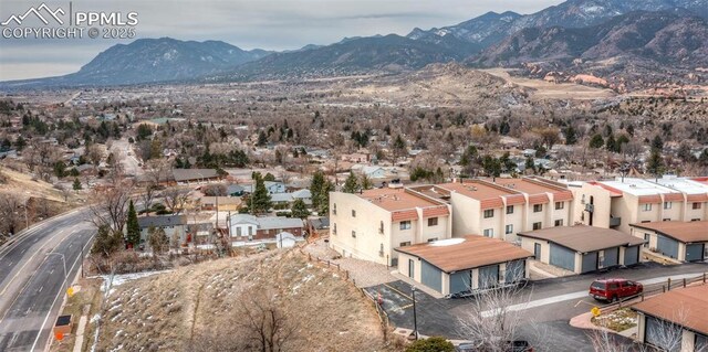 birds eye view of property with a residential view and a mountain view