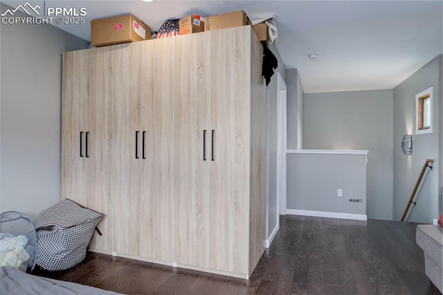 bedroom featuring wood finished floors