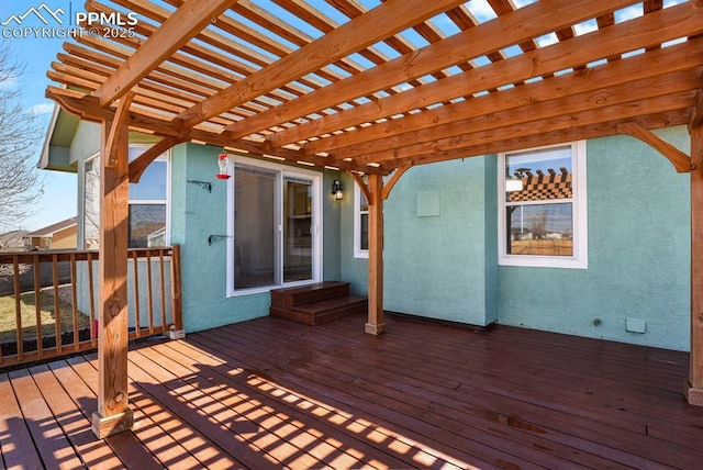 wooden deck with a pergola