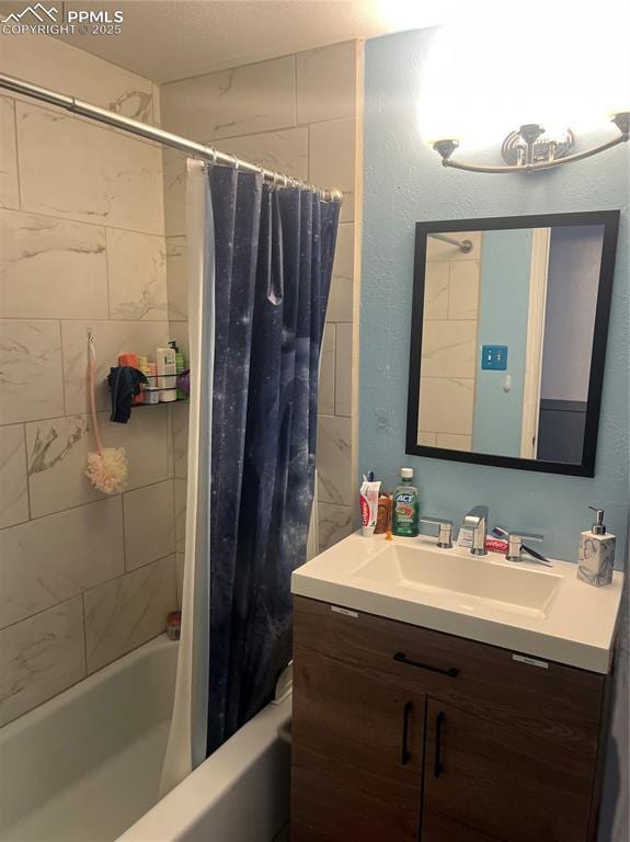 bathroom with vanity and shower / bathtub combination with curtain