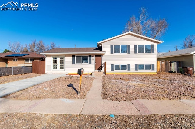 tri-level home with fence