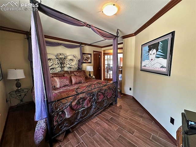 bedroom featuring baseboards, wood tiled floor, and crown molding