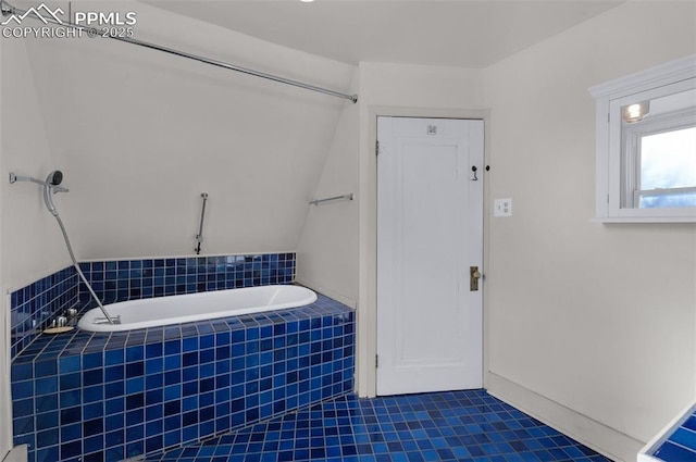 full bathroom featuring tiled bath