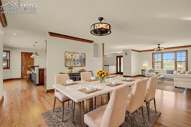 14060 Black Forest Rd, Colorado Springs, CO 80908 - dining room with recessed lighting, light wood-style floors, plenty of natural light, and baseboards