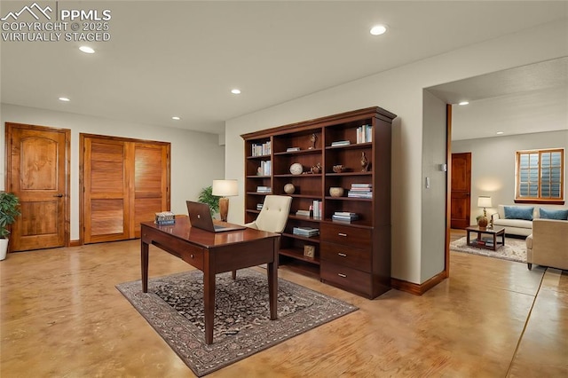 14060 Black Forest Rd, Colorado Springs, CO 80908 - office featuring baseboards, concrete floors, and recessed lighting