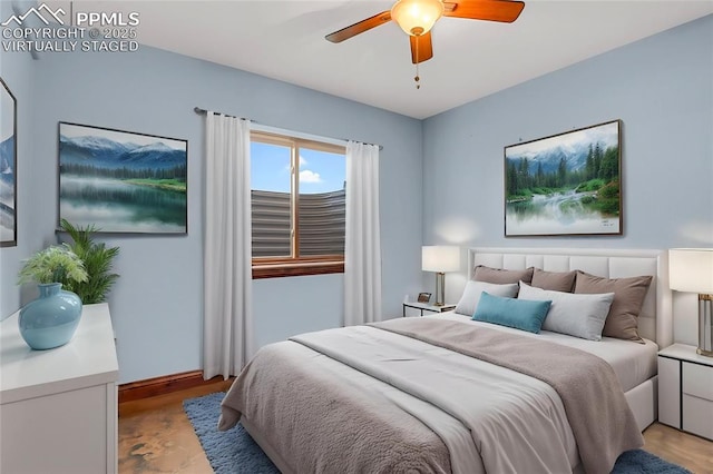 14060 Black Forest Rd, Colorado Springs, CO 80908 - bedroom featuring baseboards, light wood-style floors, and ceiling fan