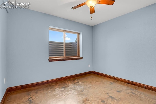 14060 Black Forest Rd, Colorado Springs, CO 80908 - unfurnished room with unfinished concrete floors, baseboards, and a ceiling fan