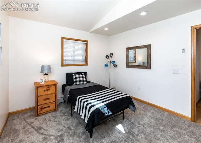 carpeted bedroom featuring recessed lighting, a baseboard heating unit, and baseboards