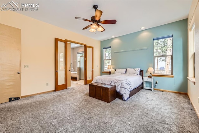 bedroom featuring baseboards, carpet, recessed lighting, ensuite bathroom, and a ceiling fan