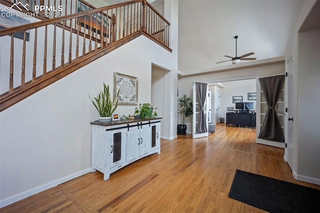 14650 Eastonville Rd, Elbert, CO 80106 - foyer featuring baseboards, ceiling fan, stairs, and wood finished floors