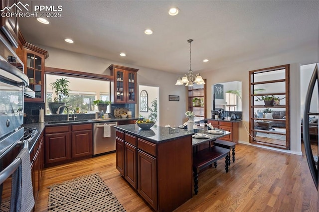 14650 Eastonville Rd, Elbert, CO 80106 - kitchen with stainless steel appliances, an inviting chandelier, a sink, and recessed lighting