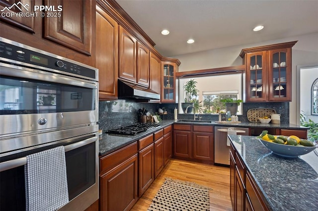 14650 Eastonville Rd, Elbert, CO 80106 - kitchen with appliances with stainless steel finishes, a sink, light wood finished floors, recessed lighting, and under cabinet range hood