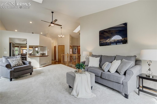 living area featuring light colored carpet, recessed lighting, high vaulted ceiling, visible vents, and a ceiling fan