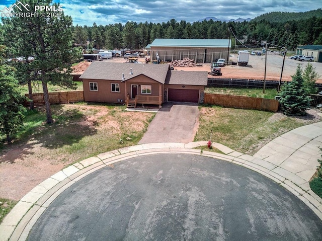 drone / aerial view with a view of trees