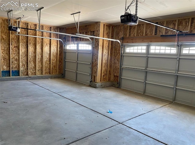 garage featuring a garage door opener