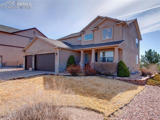 view of front of house with concrete driveway, a garage, stone siding, and stucco siding