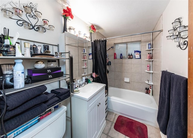 full bathroom featuring vanity, shower / bath combination with curtain, and toilet