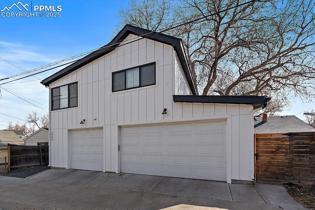 detached garage with fence