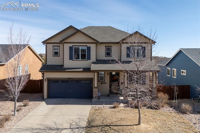 view of front of home featuring fence, concrete driveway, roof with shingles, covered porch, and a garage