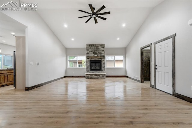 1309 Stone Ridge Dr, Woodland Park, CO 80863 - unfurnished living room featuring high vaulted ceiling, light wood-style floors, and ceiling fan