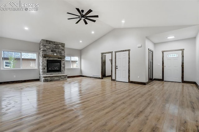 1309 Stone Ridge Dr, Woodland Park, CO 80863 - unfurnished living room featuring a wealth of natural light, visible vents, a ceiling fan, and light wood finished floors