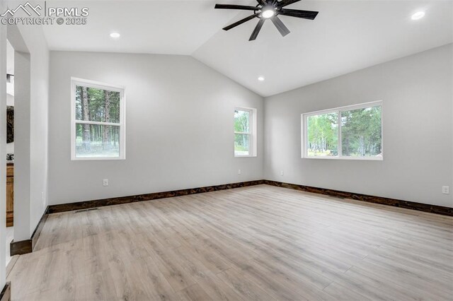 1309 Stone Ridge Dr, Woodland Park, CO 80863 - spare room with lofted ceiling, wood finished floors, a ceiling fan, and baseboards
