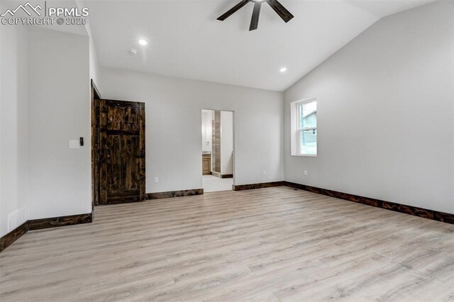 1309 Stone Ridge Dr, Woodland Park, CO 80863 - unfurnished room with visible vents, baseboards, lofted ceiling, wood finished floors, and a ceiling fan