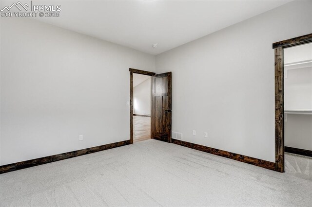 1309 Stone Ridge Dr, Woodland Park, CO 80863 - carpeted spare room featuring visible vents and baseboards