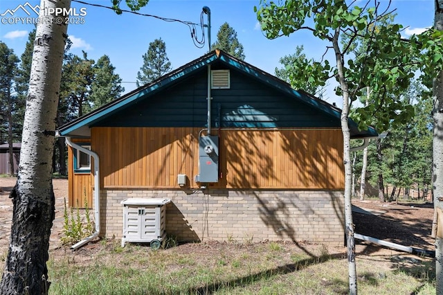 987 Blossom Rd, Woodland Park, CO 80863 - view of home's exterior with brick siding