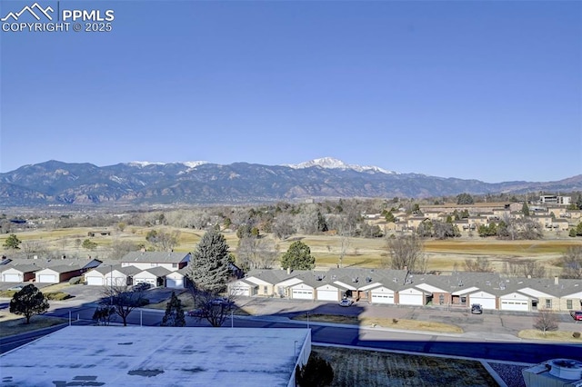 property view of mountains with a residential view