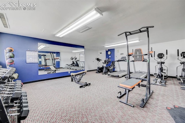 gym featuring visible vents and baseboards