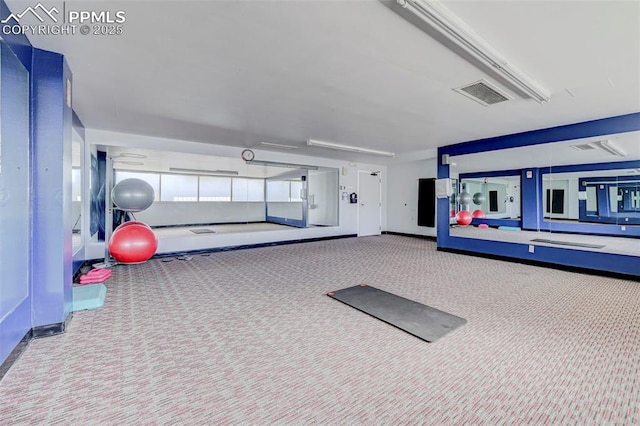 gym featuring visible vents and carpet floors