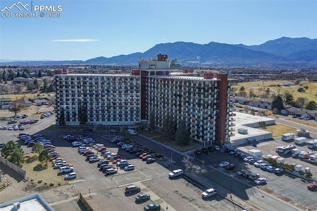 bird's eye view with a mountain view and a city view