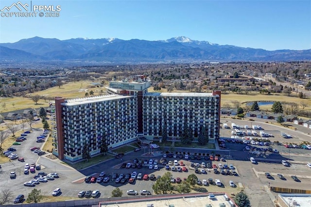 drone / aerial view featuring a mountain view