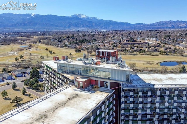 birds eye view of property featuring a water and mountain view