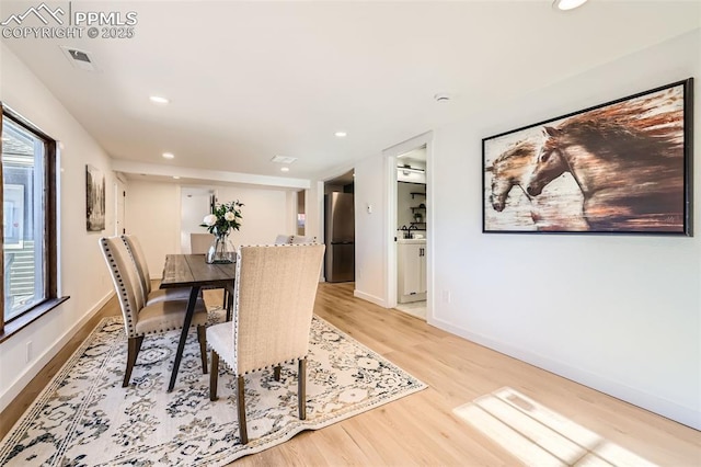 dining area featuring visible vents, recessed lighting, baseboards, and wood finished floors