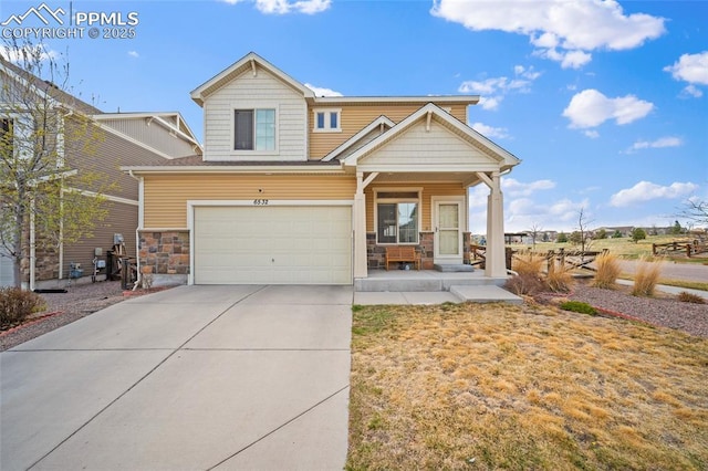craftsman-style home featuring a porch, a garage, stone siding, and driveway