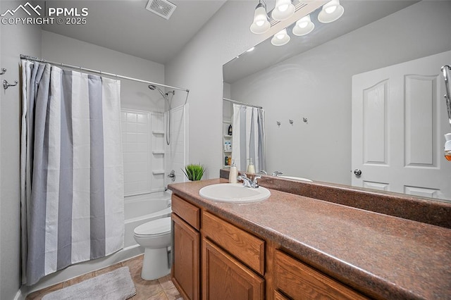 bathroom featuring toilet, vanity, shower / tub combo with curtain, visible vents, and tile patterned floors