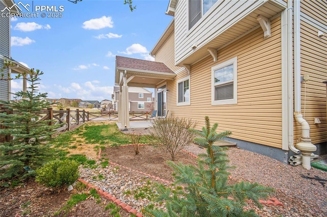 view of yard with a patio and fence