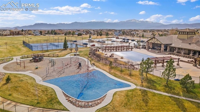 view of pool with a mountain view