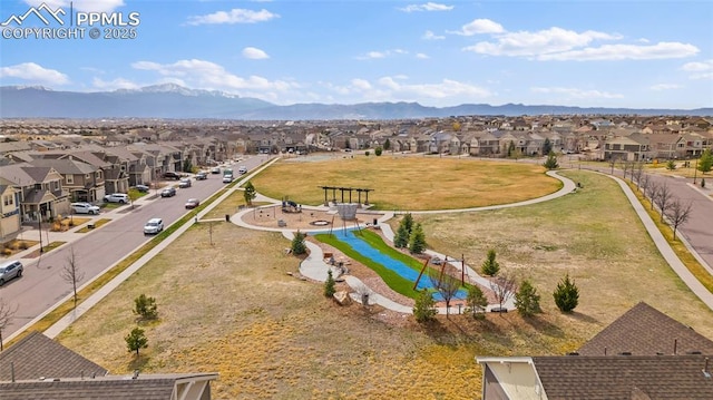 bird's eye view with a mountain view and a residential view