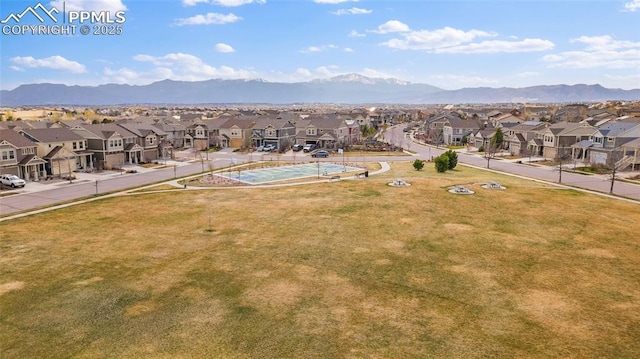 bird's eye view featuring a mountain view and a residential view