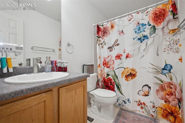 full bath with vanity, tile patterned floors, toilet, and a shower with curtain